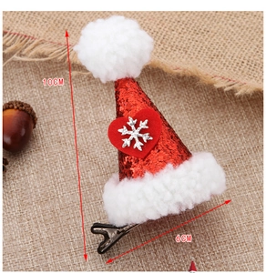 Detail of red sequined Christmas hat hair clip with snowflake decor, 10cm height dimension