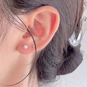 Minimalist 925 sterling silver pearl stud earrings set shown on model for elegant look