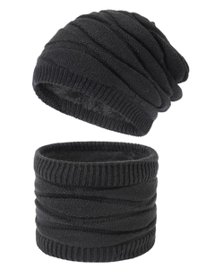 Detail of black knitted beanie and neck warmer set with warm fleece lining texture