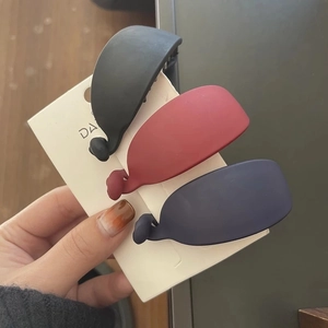 Set of 3 matte banana hair clips in black, red, and navy blue for elegant ponytail styling
