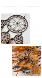 Detailed view of handmade dream catcher featuring brown mesh with beads and orange feathers