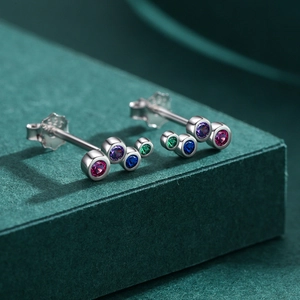Elegant S925 sterling silver stud earrings featuring four vibrant colorful gemstones