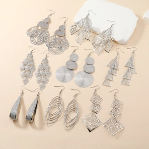 Detailed set of 8 silver alloy earrings featuring geometric hollow drop and leaf designs