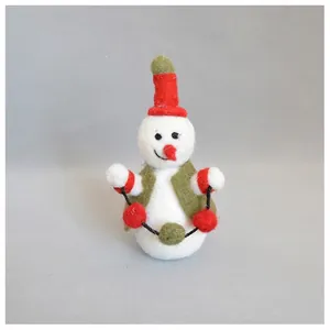Handcrafted wool felt snowman ornament with red hat and green vest for Christmas decor