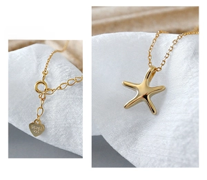 Detail of S925 sterling silver starfish pendant with lobster clasp and heart logo tag