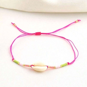 Bohemian adjustable pink braided bracelet with natural seashell and colorful beads