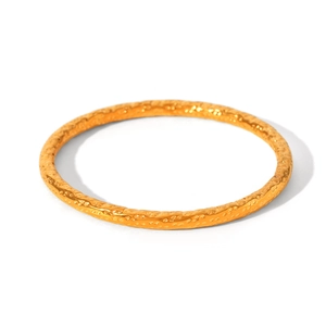 Classic gold stainless steel bracelet featuring a vintage hammered texture on a white background