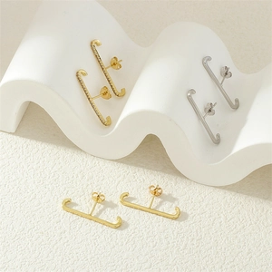 Elegant minimalist geometric ear cuffs in gold and silver with sparkling cubic zirconia