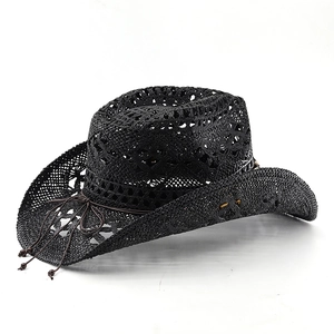 Close-up of black straw cowboy hat featuring intricate hollow weaving and wooden beads
