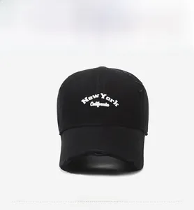 Detailed embroidery of New York California on distressed black cotton baseball cap