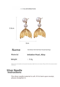 Detailed view of gold fishtail pearl earrings showing dimensions 3.9cm and 925 silver needles