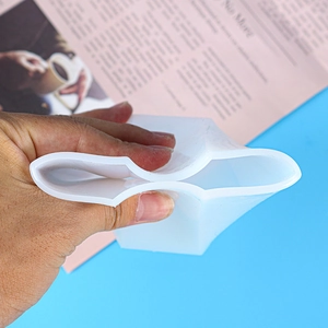Detail showing the flexibility and elasticity of a white translucent silicone resin mold