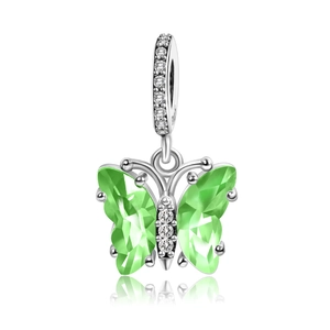 Macro detail of silver butterfly charm with green crystal and cubic zirconia inlay