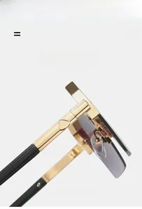 Close-up of golden metal sunglasses hinges with lightweight elastic texture material