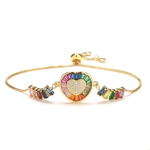 Gold heart-shaped slider bracelet with rainbow cubic zirconia on a white background
