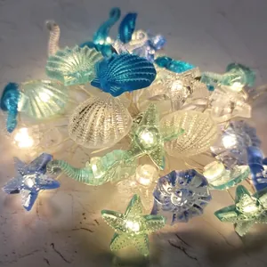 Marine themed LED string lights featuring sea stars and shells with warm white glow
