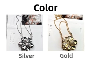 Close-up of metallic flower-shaped mini bags in gold and silver with bead chains