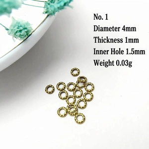 Detail of 4mm antique bronze hammered spacer beads for DIY jewelry with size specs