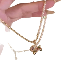 Collier double rang plaqué or avec perles et pendentif tigre en strass pour femme