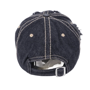 Rear view of washed denim baseball cap with distressed details and adjustable metal buckle