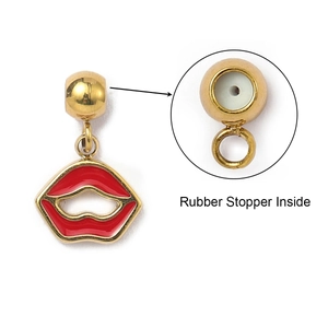 Detail view of red enamel lip charm with internal rubber stopper for positioning