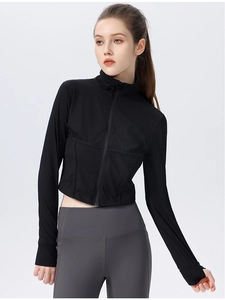 Close-up of slim fit black ribbed yoga jacket with zipper and high waist sports leggings