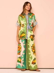 Fashionable summer two-piece set with vibrant fruit prints and wide-leg trousers