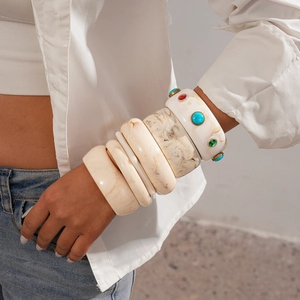 Minimalist geometric resin bangle set with marble patterns and vintage gemstones