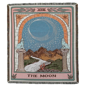 Detailed weave of Bohemian Moon Tarot cotton blanket featuring fringe and sun-moon patterns