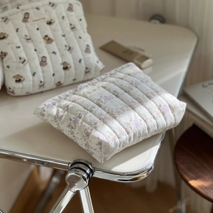 Quilted cotton cosmetic bags featuring bear and bunny floral prints in soft tones
