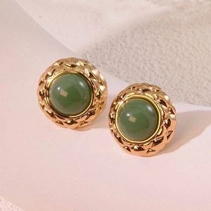 Vintage gold-tone round button earrings with green cabochon gems and quilted texture edges