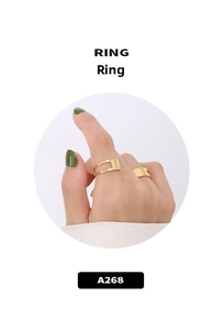 Detail of 18K gold plated minimalist rings featuring layered and wide band designs