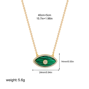 Detailed view of 18K gold plated evil eye pendant with green stone and size specs