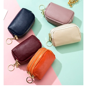 Mini pebbled leather coin purse in assorted colors with gold zipper and keychain ring