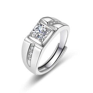 Macro detail of silver adjustable men's ring featuring large round-cut zircon and side stones