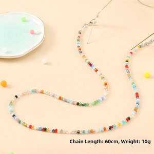 Detail view of 60cm colorful beaded glasses chain with gold hooks and rubber ends
