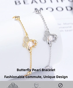 Detail of 925 sterling silver butterfly bracelet with a white pearl and zircon accents