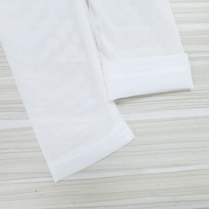 Detail of the white sheer mesh sleeve with professional reinforced hem stitching