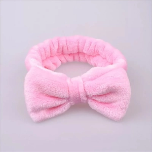 Rosa Korallenfleece-Stirnband mit großer Schleife zum Waschen von Gesicht und Hautpflege