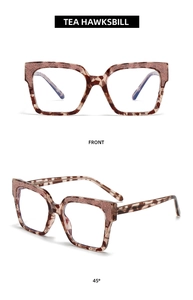 Detail of tea hawksbill square frames with rose gold glitter and high-gloss finish