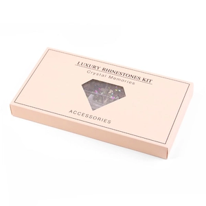 Luxury 21-grid nail art rhinestone kit in a pink box with a diamond-shaped window