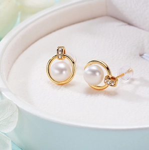 Elegant freshwater pearl stud earrings in gold finish with sparkling zircon accents