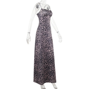 Detail showing the leopard print fabric and slim fit design of the square neck maxi dress