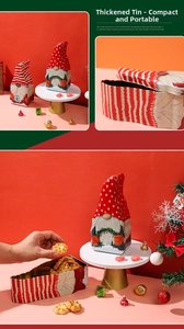 Detail of Christmas gnome tin candy boxes made of thickened tinplate for cookie storage