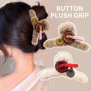 Plush faux fur shark hair claw clip with button and ribbon detail for women's hairstyles