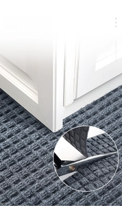Detail of gray rubber mat showing water absorption and custom cut edge feature