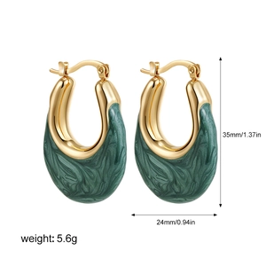 Detail view of U-shaped gold earrings with dark green marble enamel, 35mm size