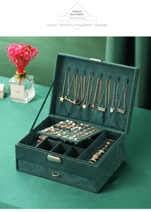 Detailed view of emerald green velvet jewelry box with double-layer storage compartments