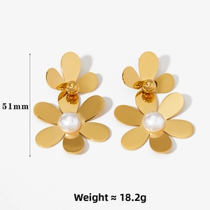 Detail view of 51mm gold flower earrings with pearls weighing approximately 18.2g