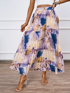 Detail of high-waist pleated midi skirt featuring abstract watercolor oil painting print